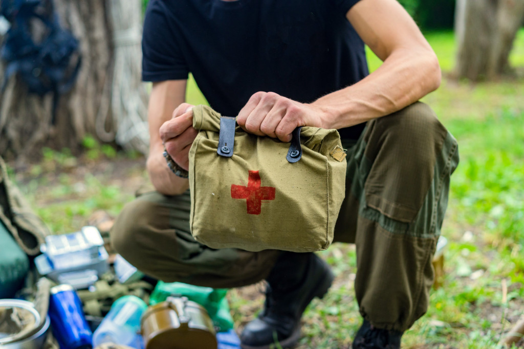 man holding first aid kit