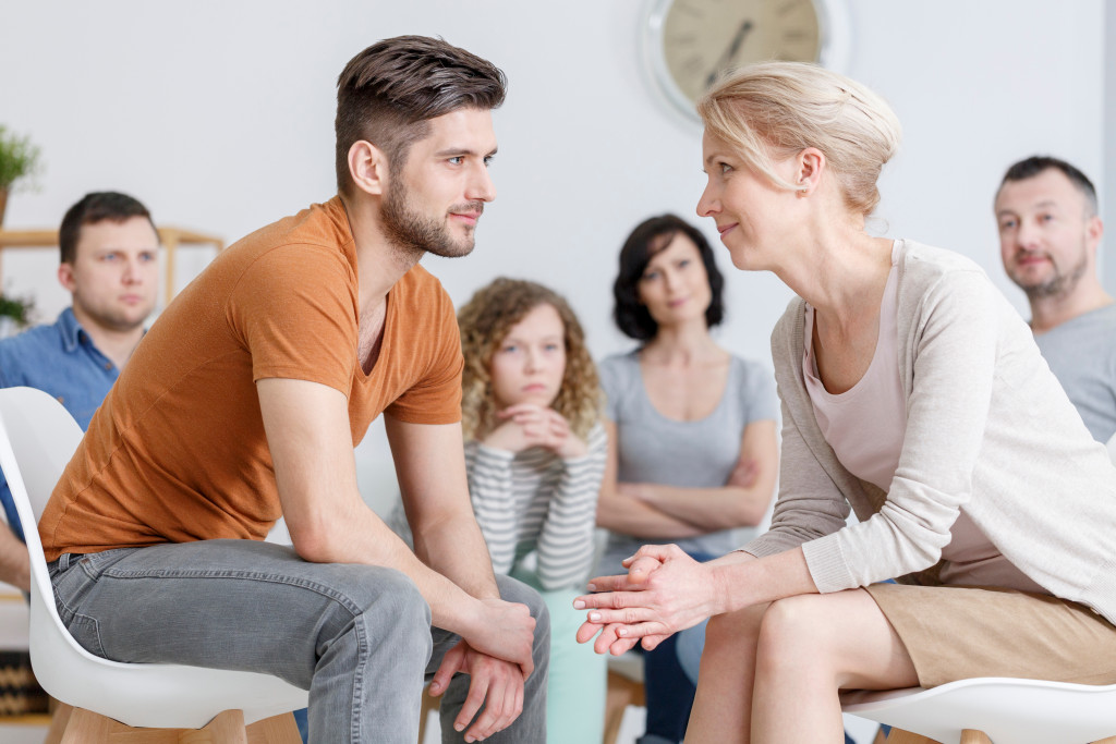 man and woman having a conversation