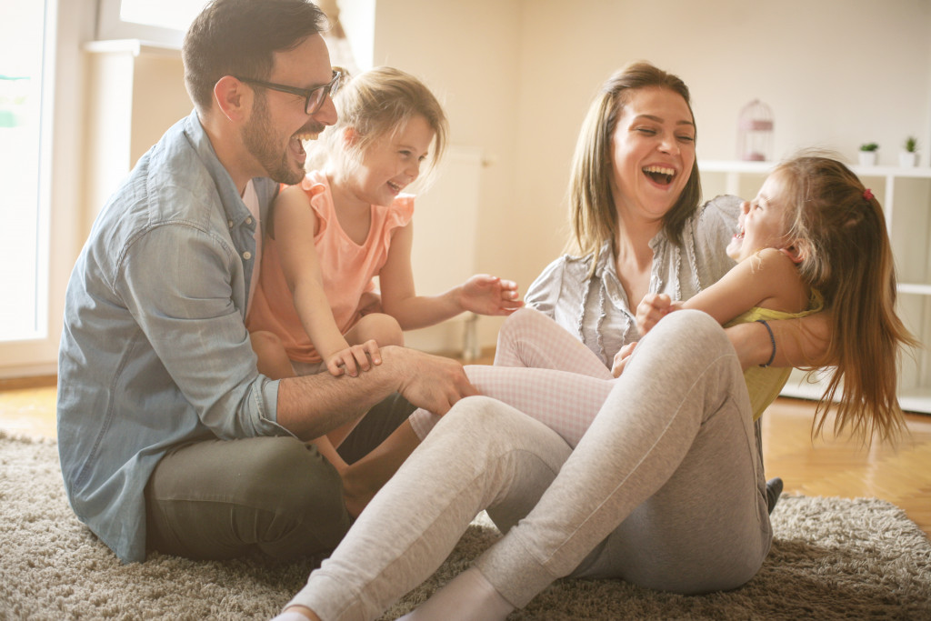 A happy family laughing and smiling together