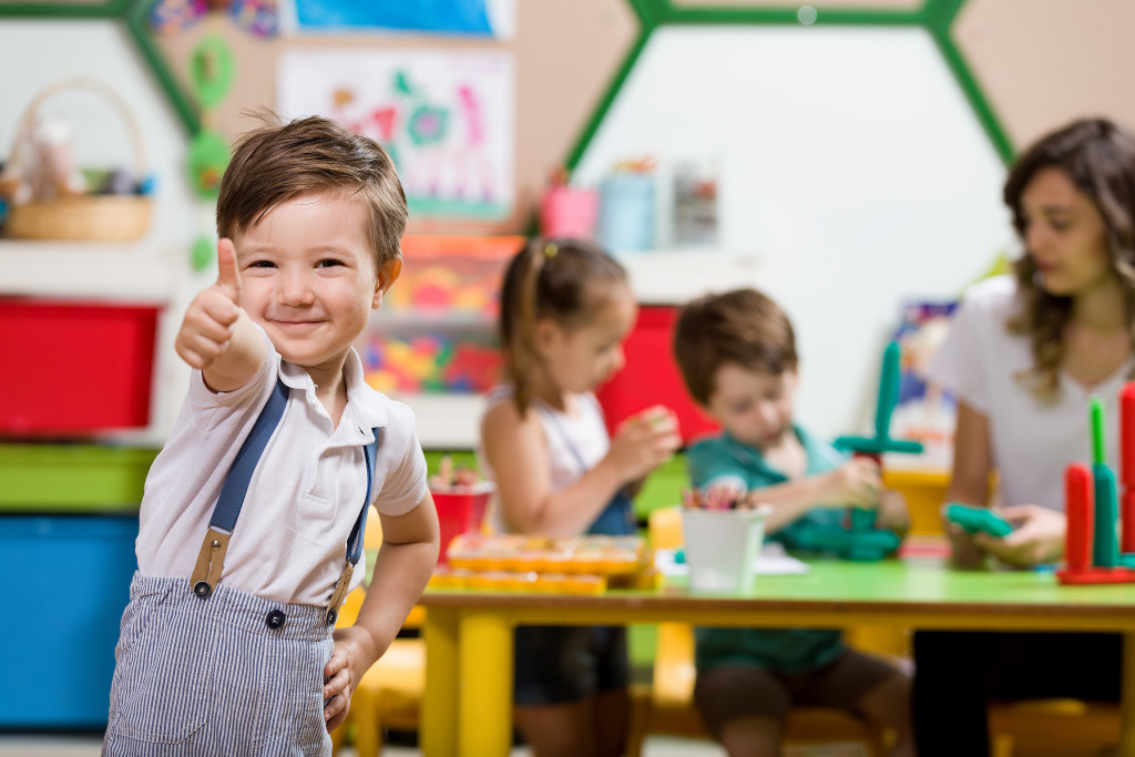 a child care student smiling and happy